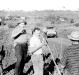 Mutirão para instalação de rede de luz elétrica de Novo Sarandi até General Rondon, em  1957.
O senhor de garrafa na mão e aba de chapéu virada, é o pioneiro Helmuth Koch. 